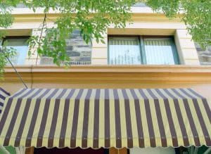 retractable vs fixed awnings